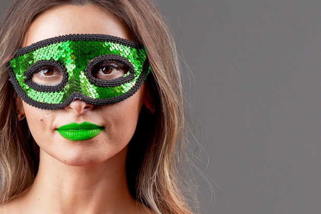 Free Photo gorgeous young woman with colored mask