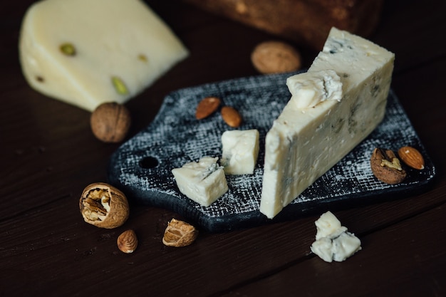 Gorgonzola blue cheese. Italian blue cheese Gorgonzola with nuts.