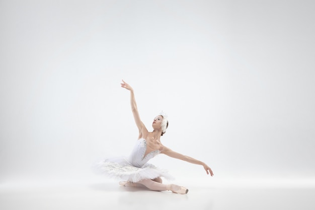 Free photo graceful classic ballerina dancing isolated on white  background.