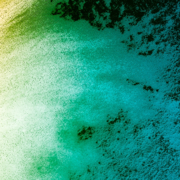 Free photo gradient colored liquid with foam