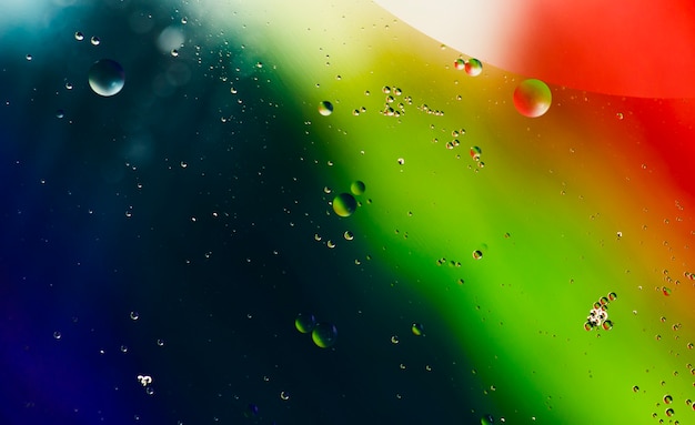 Free photo gradient colourful background with droplets