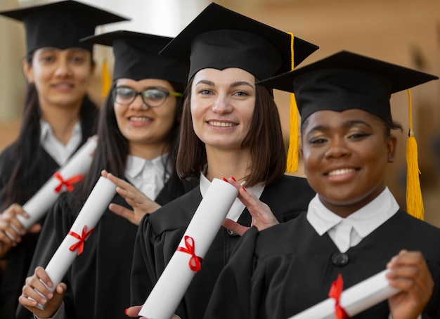 Graduate students wearing cap and gown medium shot