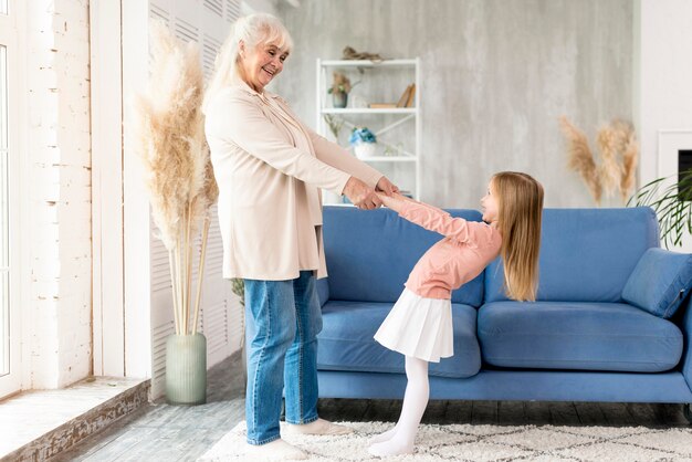 Grandma with girl at home