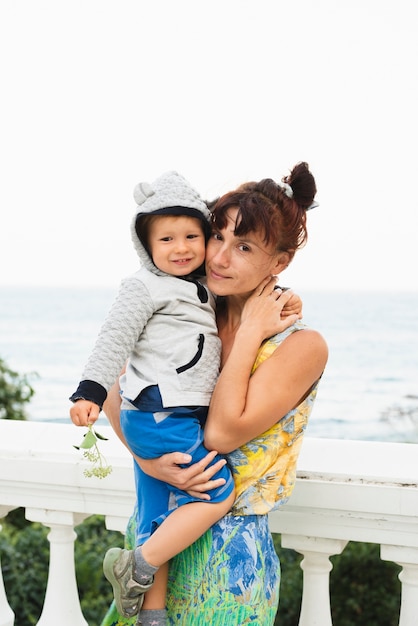 Grandma with grandson at seaside