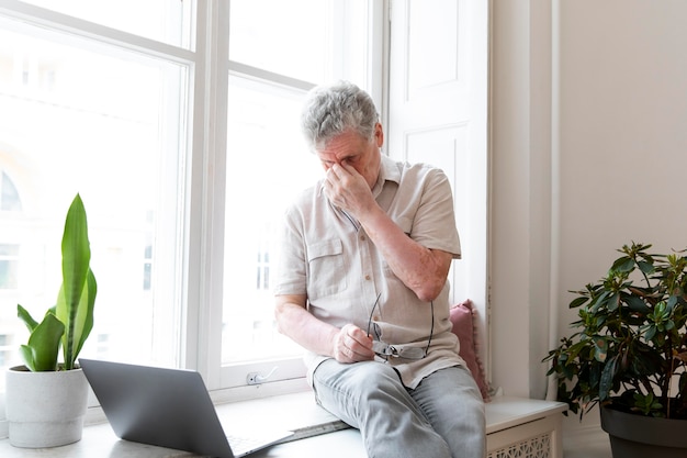 Grandparent learning to use digital device