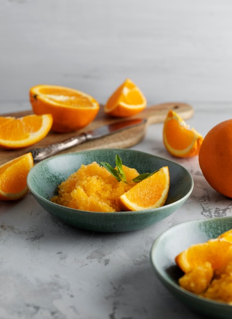 Granita dessert with orange still life high angle