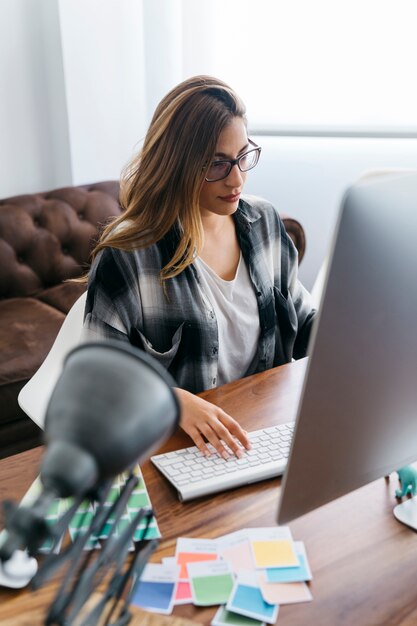 Graphic designer working in front of monitor