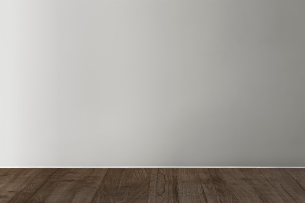 Gray blank concrete wall mockup with a wooden floor