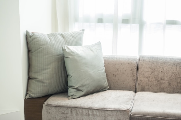 Free photo gray cushions on a couch