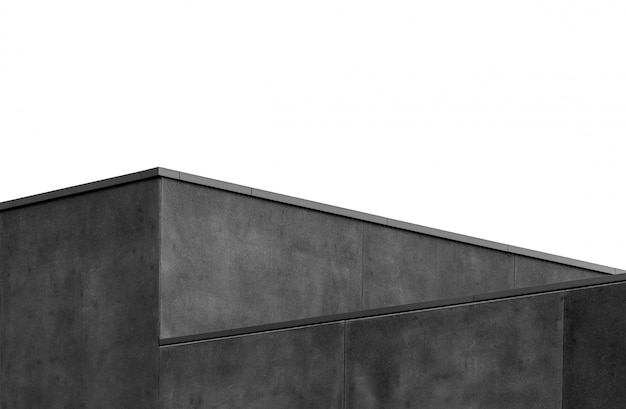 Free photo gray scale shot of a geometrical gray wall