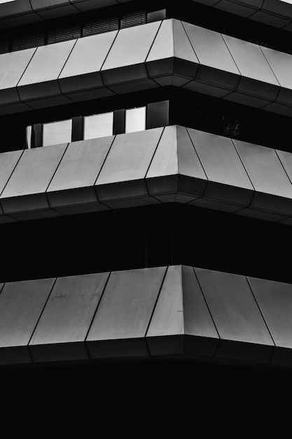 Free photo grayscale photography of high-rise building