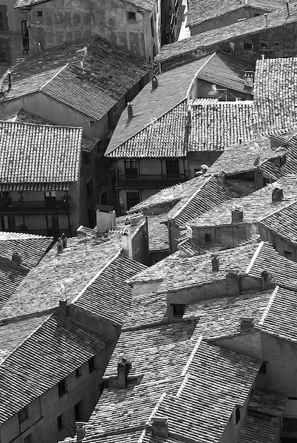 Free Photo grayscale shot of rooftops of a small village in spain