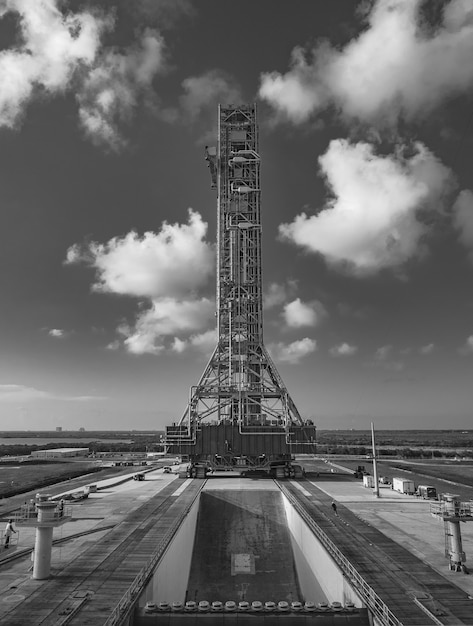 Free Photo grayscale shot of the tower holding the sls rocket in kennedy space center