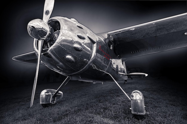 Free photo grayscale shot of the vintage airplane