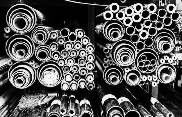 Free Photo grayscale steel pipes background