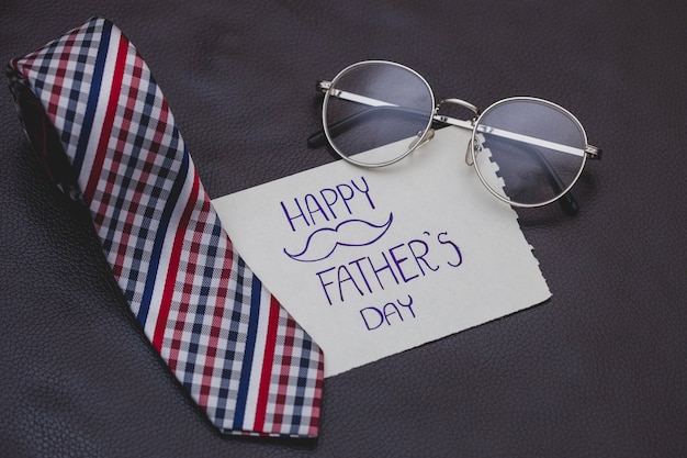 Great composition with necktie and glasses for father's day