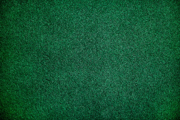 Green artificial grass textured background