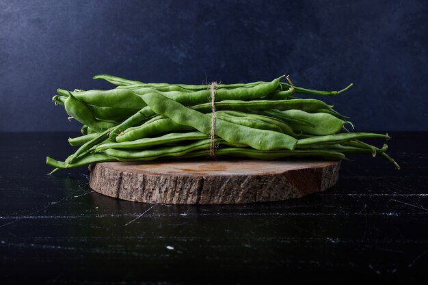 Green beans on black