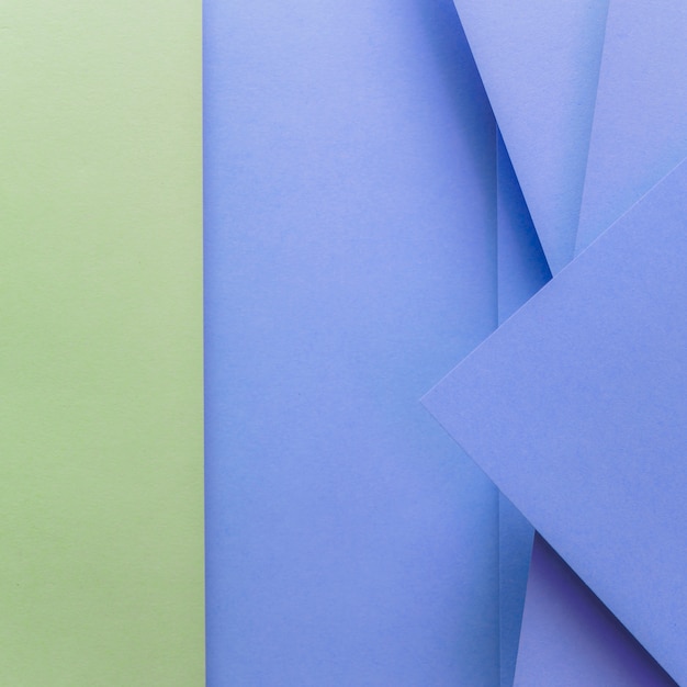 Free photo green and blue colored paper backdrop