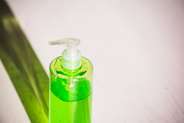 Green bottle with soap