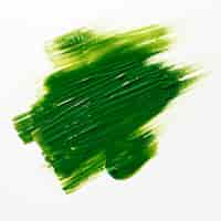 Free photo green brush stroke on white background