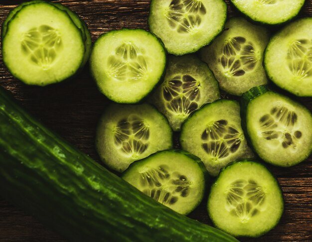 Green cucumber and slices