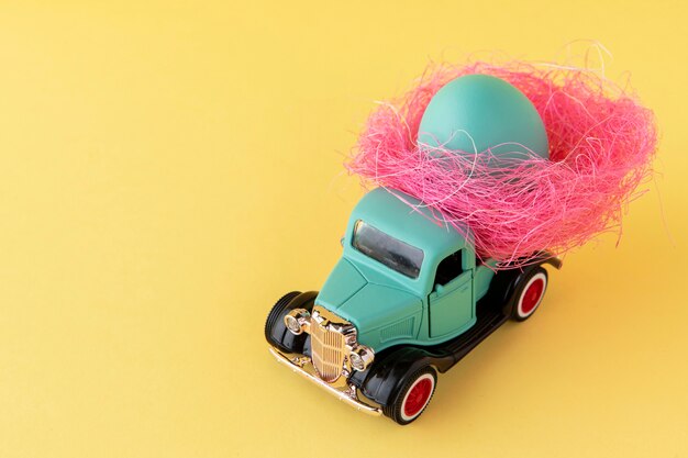 Green easter car with egg