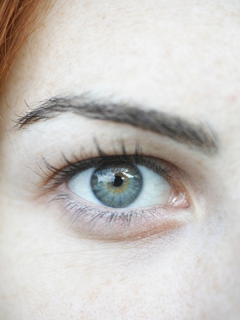 Green eye of a woman close up