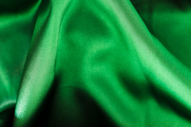 Green fabric material texture with copy space