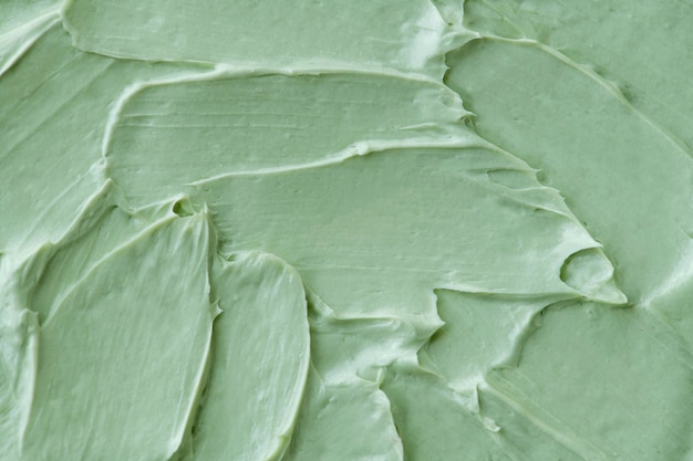 Free photo green frosting texture background close-up