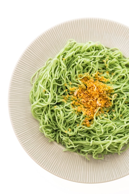 Free photo green or jade noodles in white plate