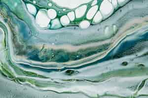 Free photo green marble swirl background diy flowing texture experimental art