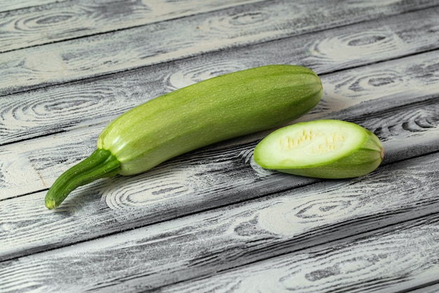 Green marrow fresh ripe mellow on wooden grey desk