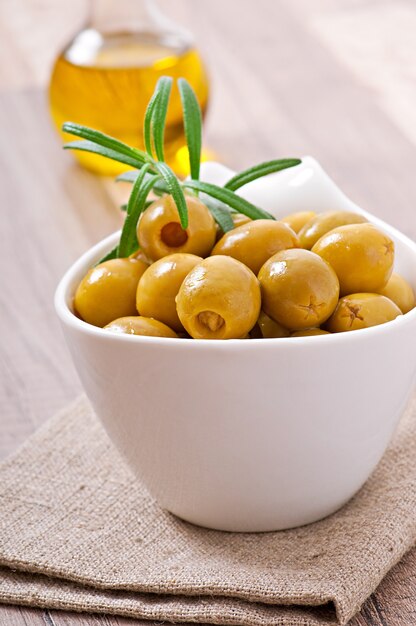 Free Photo green olives in bowl.