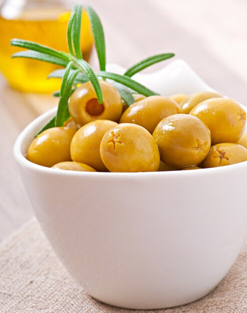 Green olives in bowl.