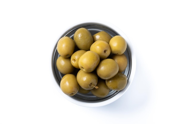 Free photo green olives in white bowl isolated on white background