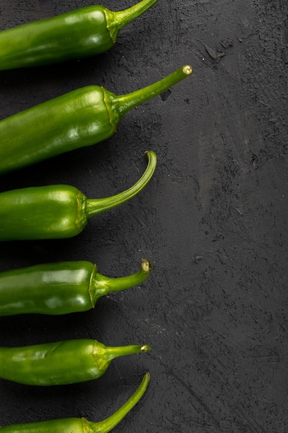 Green pepper spicy on black background