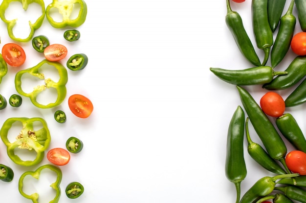 Free photo green pepper spicy hot with sliced green bell pepper on white background