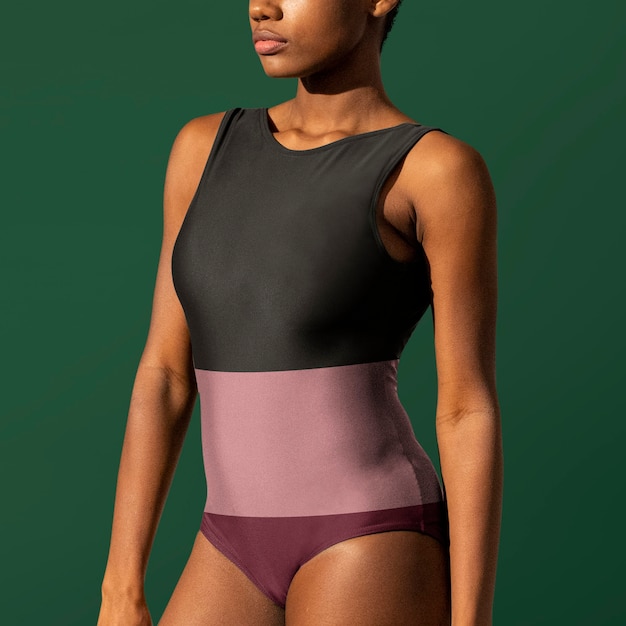 Green and pink striped one-piece swimsuit with design space retro summer fashion