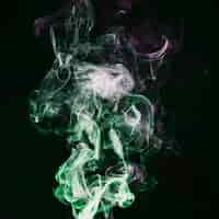 Free photo green and purple smoke