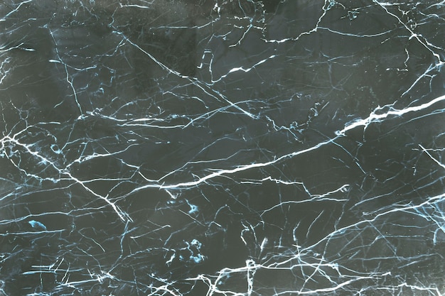 Free photo green scratched marble textured background