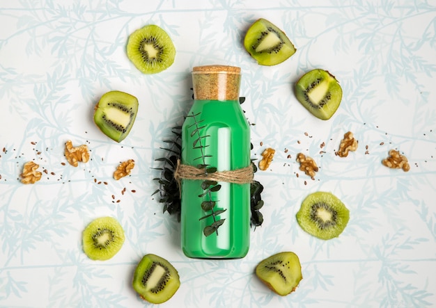 Free Photo green smoothie with nuts seeds and kiwi