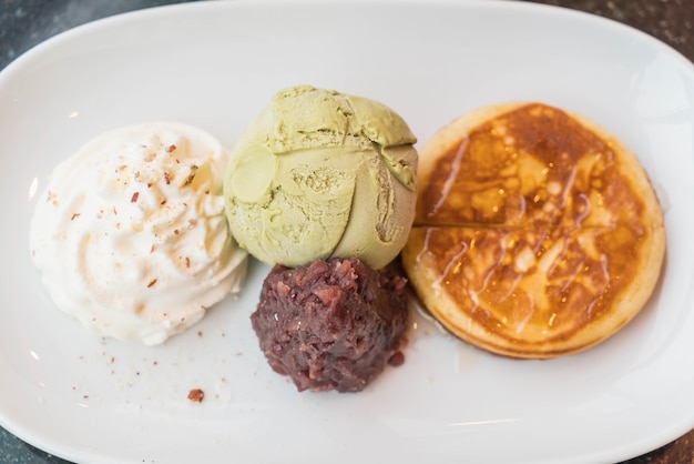 green tea ice-cream with pancake ,red bean and whipping cream