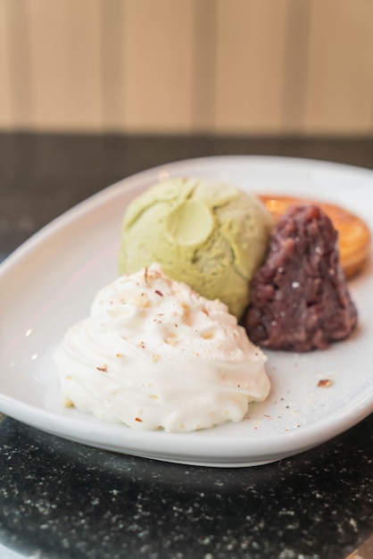 green tea ice-cream with pancake ,red bean and whipping cream