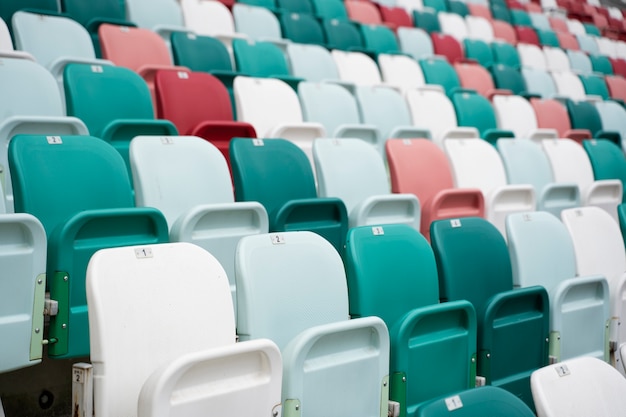 Free photo green and white grandstands at arena low angle