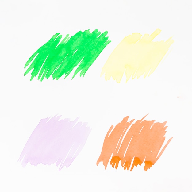 Free Photo green; yellow; pink and orange brush stroke on white backdrop