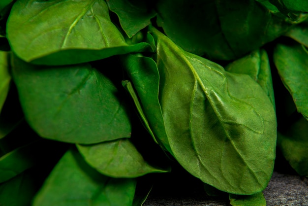 Greens on wooden grey table