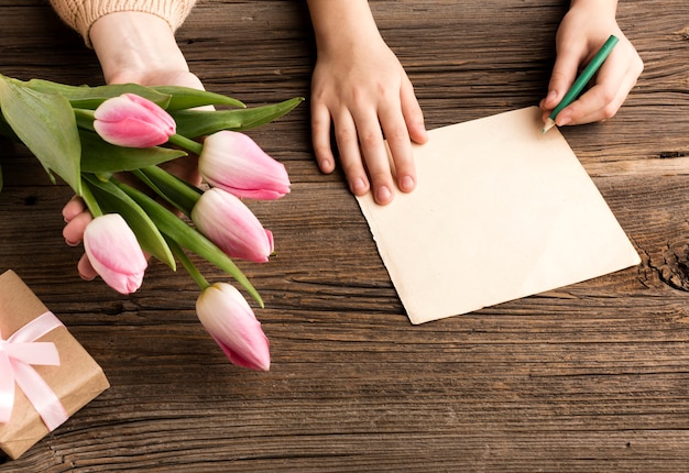 Free photo greeting card and tulips for mothers day