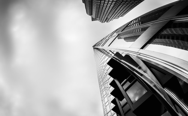 Greyscale low angle shot of high-rise buildings in the financial district of Toronto Canada