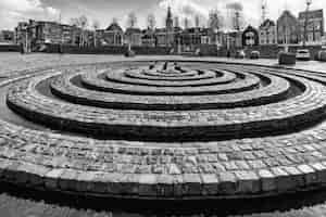 Free photo greyscale shot of a historic street landmark in nijmegen